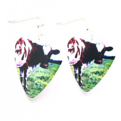 pink floyd cow earrings.JPG